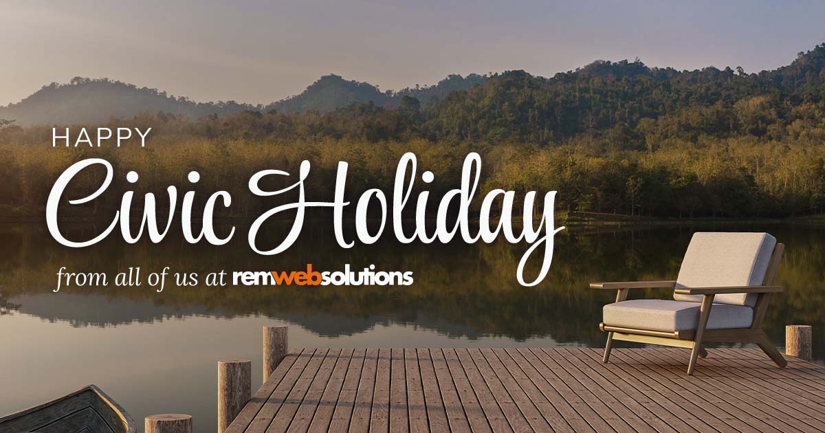 White chair on a dock with a lake and mountains